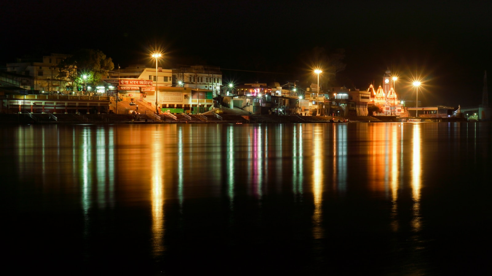 city lights turned on during night time